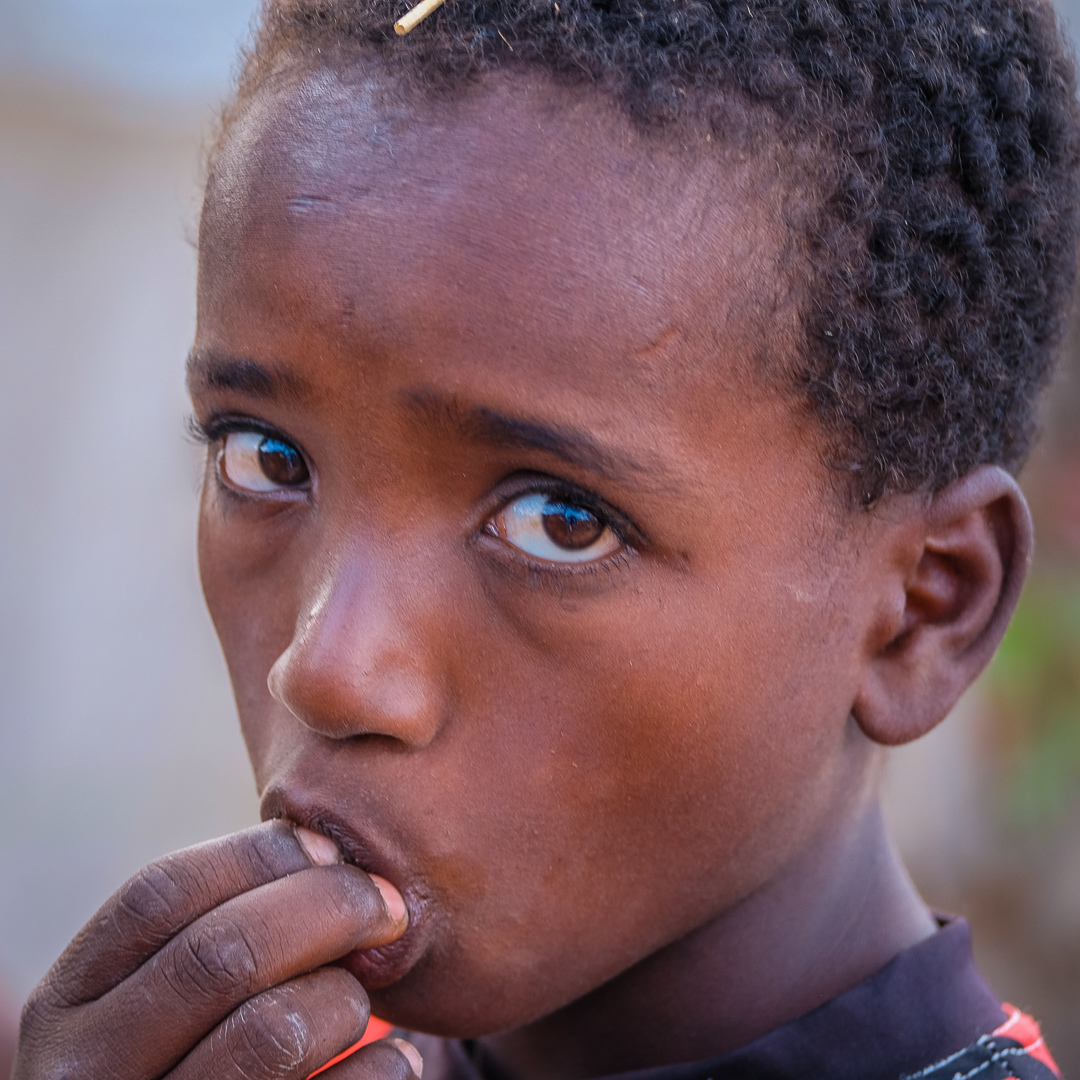 Ethiopian boy, what do you want to tell me with that look
